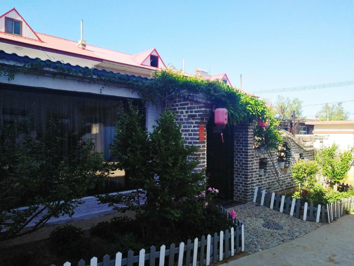 Guixu Huatang Homestay Qinhuangdao Buitenkant foto